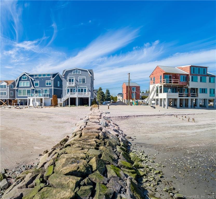 2117 Fairfield Beach Road Fairfield, CT 06824 - Photo 7 of 17 a view of houses with a street