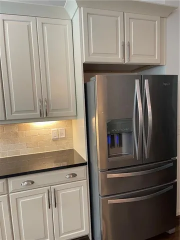 a close view of a refrigerator in kitchen