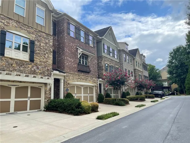 a front view of a building with street view