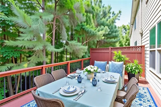 a view of a table and chairs in the roof deck