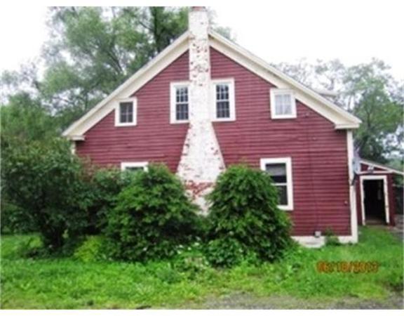 3 Bates Road Cummington, MA 01026 - Photo 2 of 15 a view of a house with a yard and plants