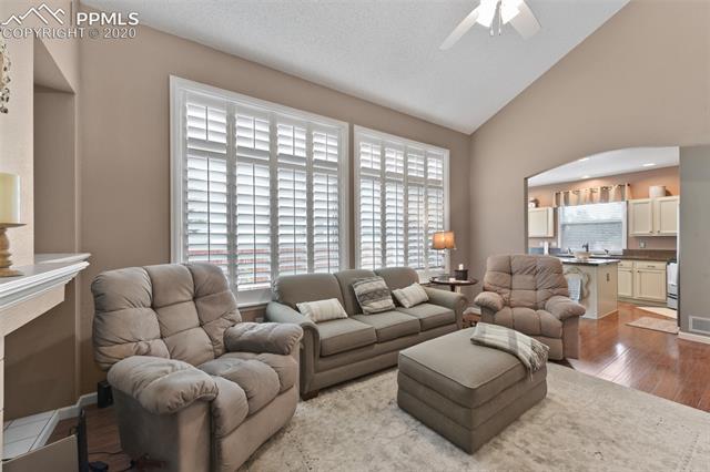 10561 Stoneflower Drive Parker, CO 80134 - Photo 13 of 41 Family Room Adjacent to Kitchen...and look at the Beautiful Shutters!!