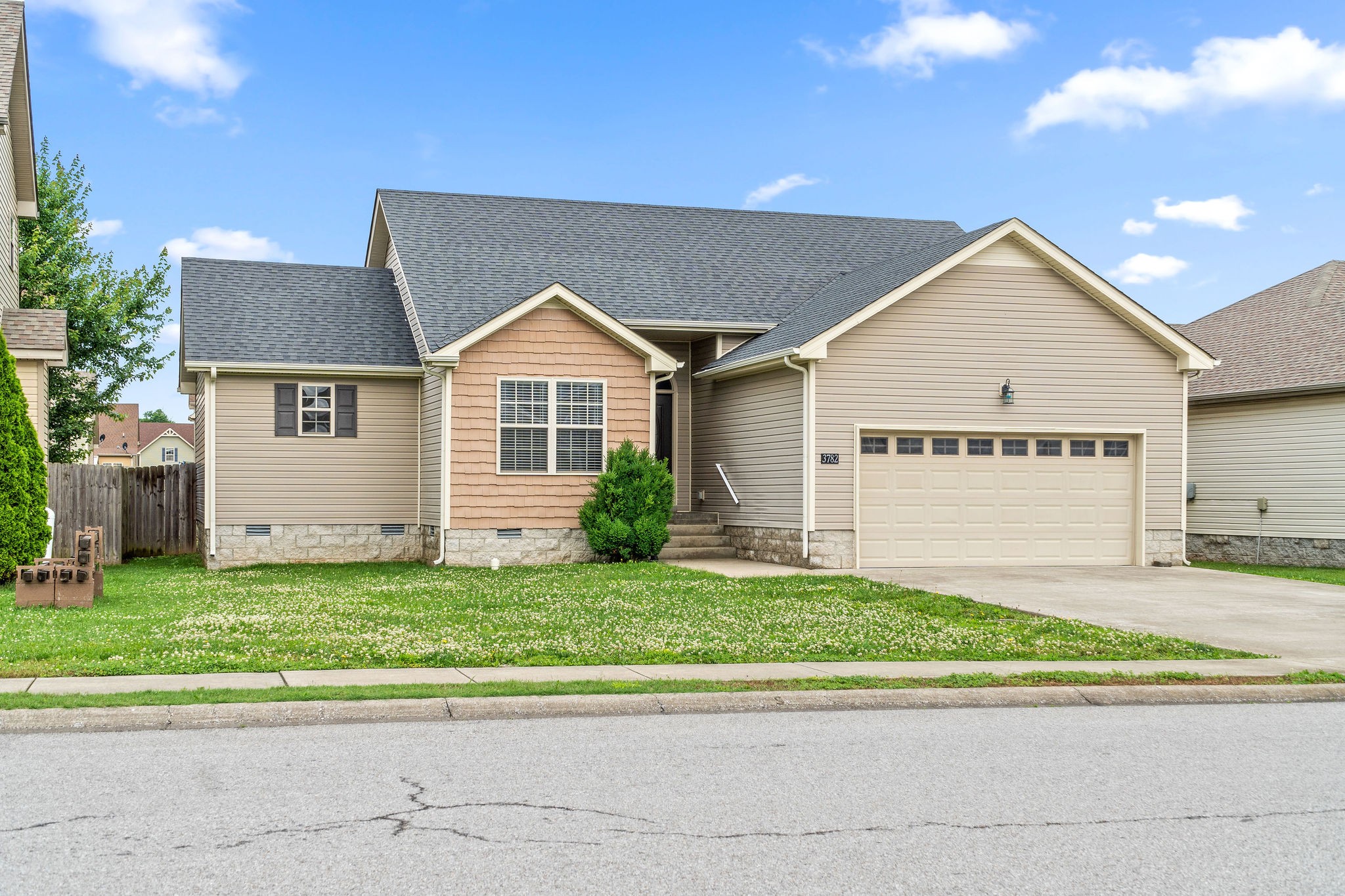 3782 Suiter Road Clarksville, TN 37040 - Photo 2 of 32 a view of a house with a yard and large parking space