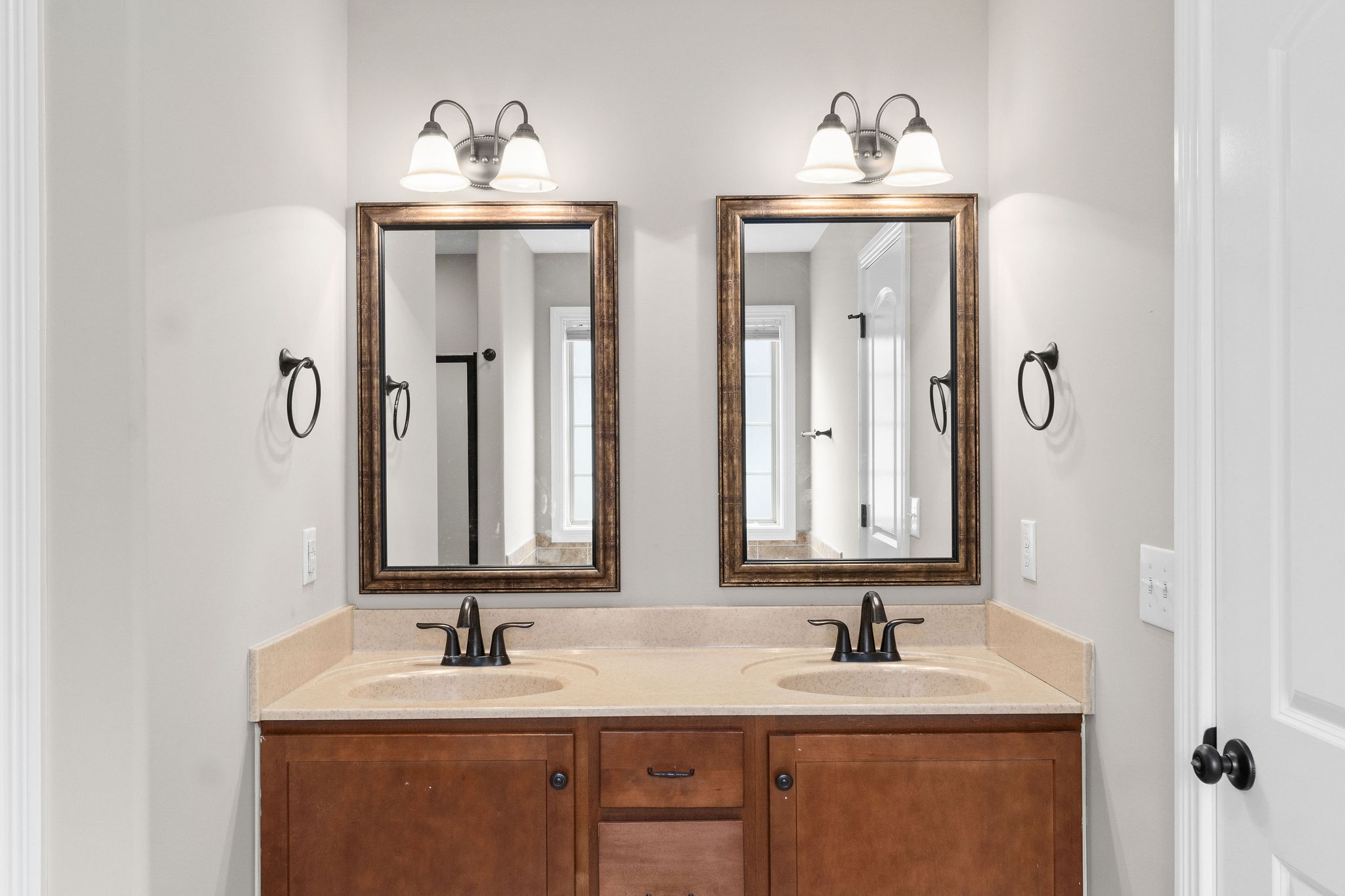 3782 Suiter Road Clarksville, TN 37040 - Photo 23 of 32 a bathroom with 2 sink and a mirror