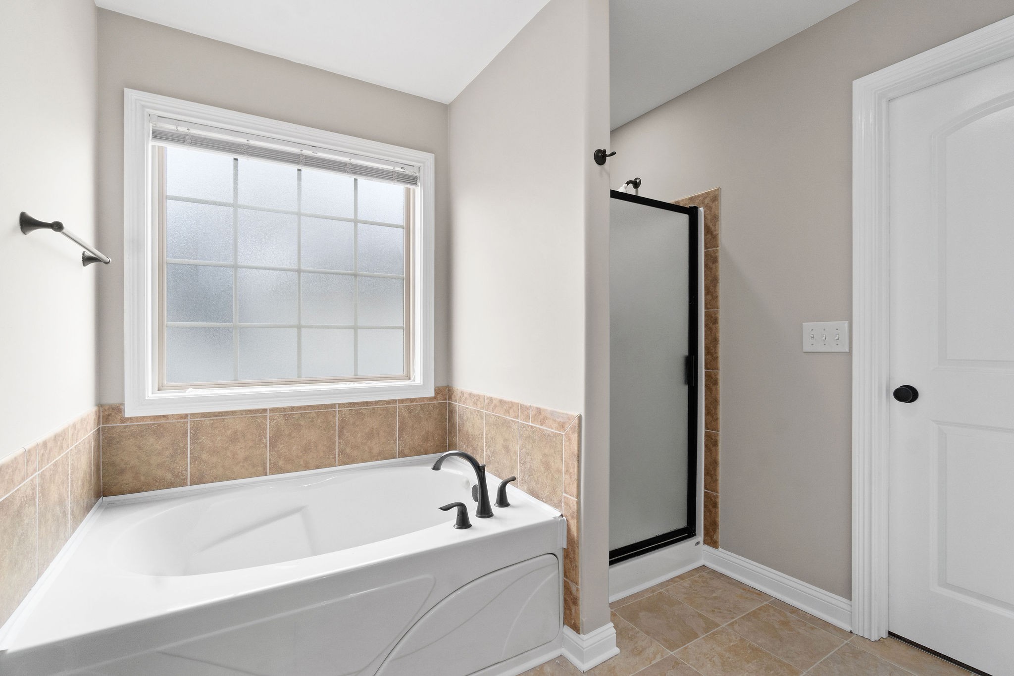 3782 Suiter Road Clarksville, TN 37040 - Photo 25 of 32 a bathroom with a tub shower and a sink