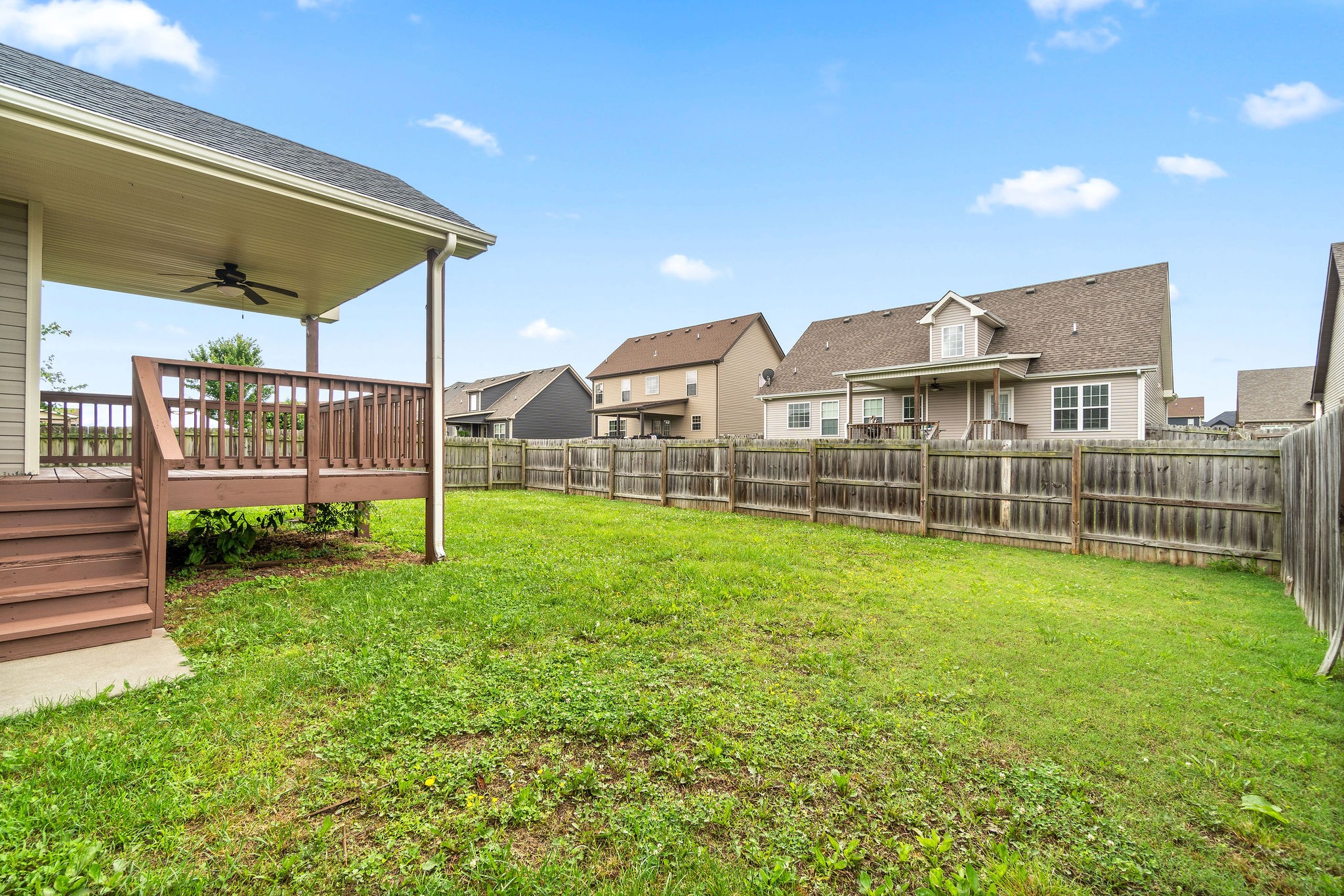 3782 Suiter Road Clarksville, TN 37040 - Photo 31 of 32 a view of a house with a backyard and a patio