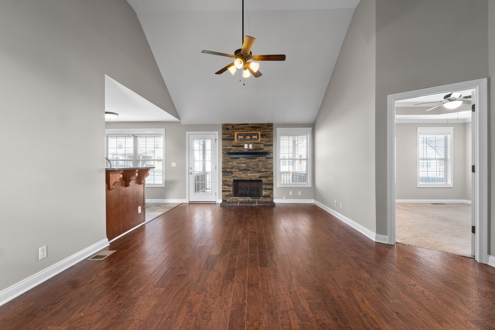 3782 Suiter Road Clarksville, TN 37040 - Photo 6 of 32 wooden floor in an empty room with a window