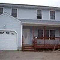 a view of a house with a balcony