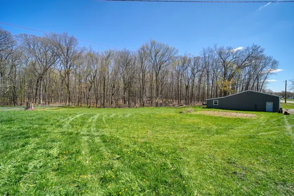 $220,000 | 12770 West Us Highway, Manitou Beach, MI 49253