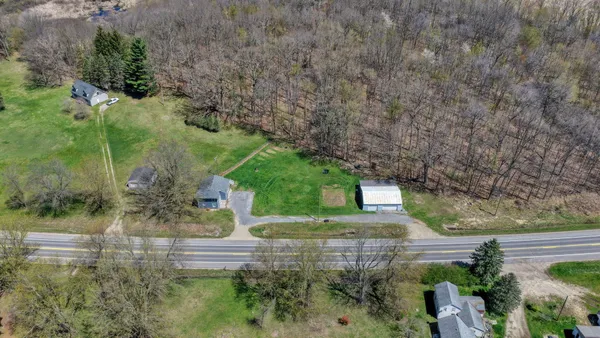 $220,000 | 12770 West Us Highway, Manitou Beach, MI 49253