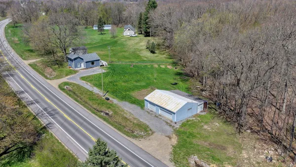$220,000 | 12770 West Us Highway, Manitou Beach, MI 49253