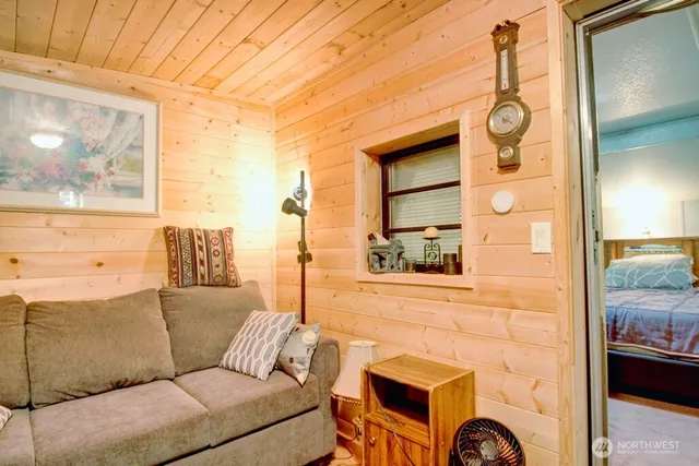 a living room with furniture and a window