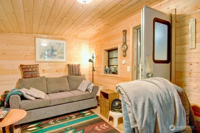 a living room with a couch and a table