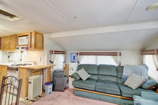 a living room with furniture and a couch