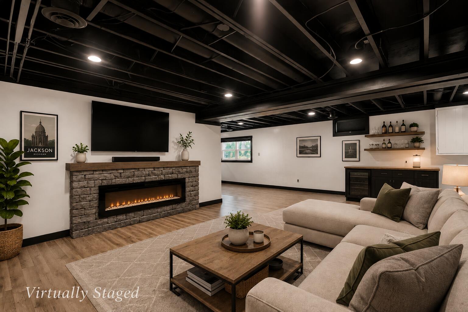 1617 Duguid Road Jackson, MI 49203 - Photo 29 of 46 Virtually staged basement living room