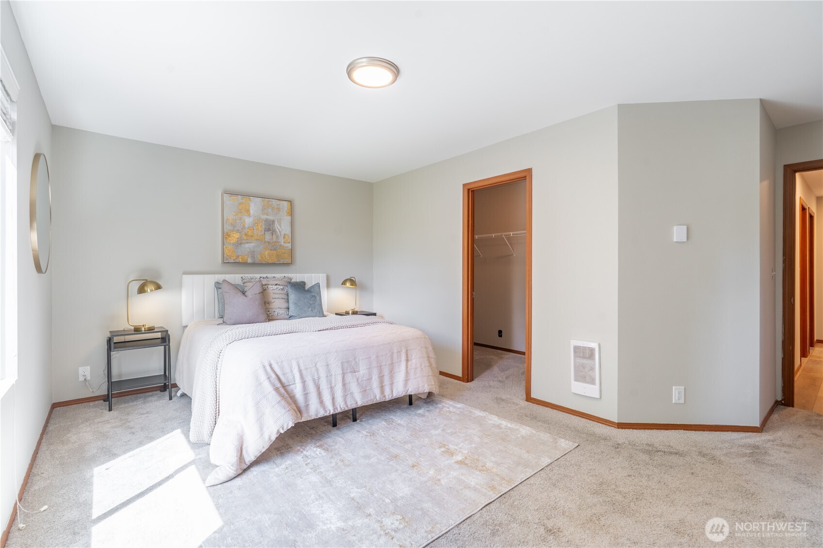 242 Riggs Drive East Enumclaw, WA 98022 - Photo 23 of 40 a bedroom with a bed and a view of bathroom