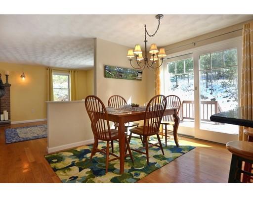 8 Adeline Road Ipswich, MA 01938 - Photo 13 of 28 a view of a dining room with furniture wooden floor and chandelier