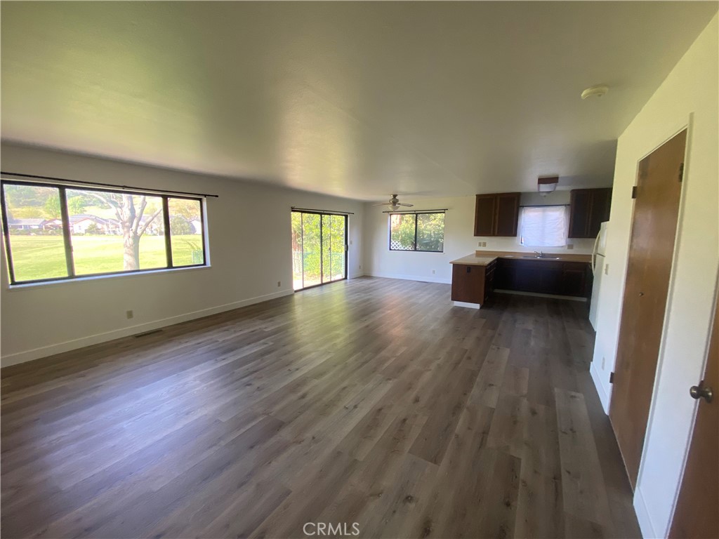 19742 Oak Flat Road Hidden Valley Lake, CA 95467 - Photo 2 of 19 Large open great room with lots of windows.