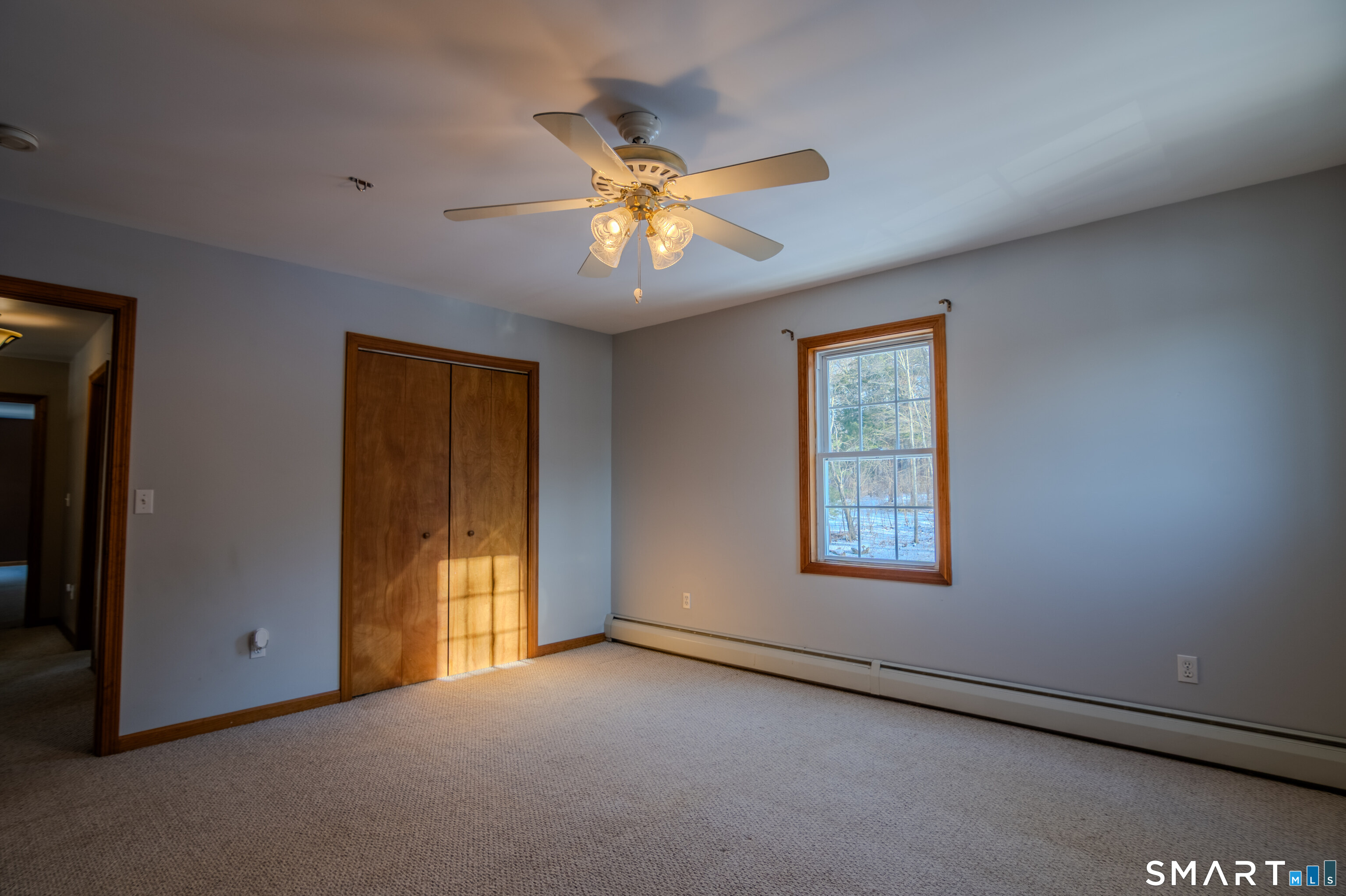 8 Juniper Lane Plainfield, CT 06354 - Photo 18 of 37 a view of an empty room with a window