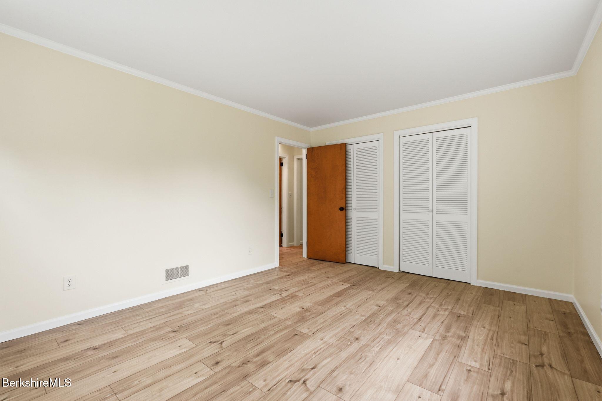 98 N Road Monroe, MA 01247 - Photo 17 of 32 a view of an empty room with wooden floor
