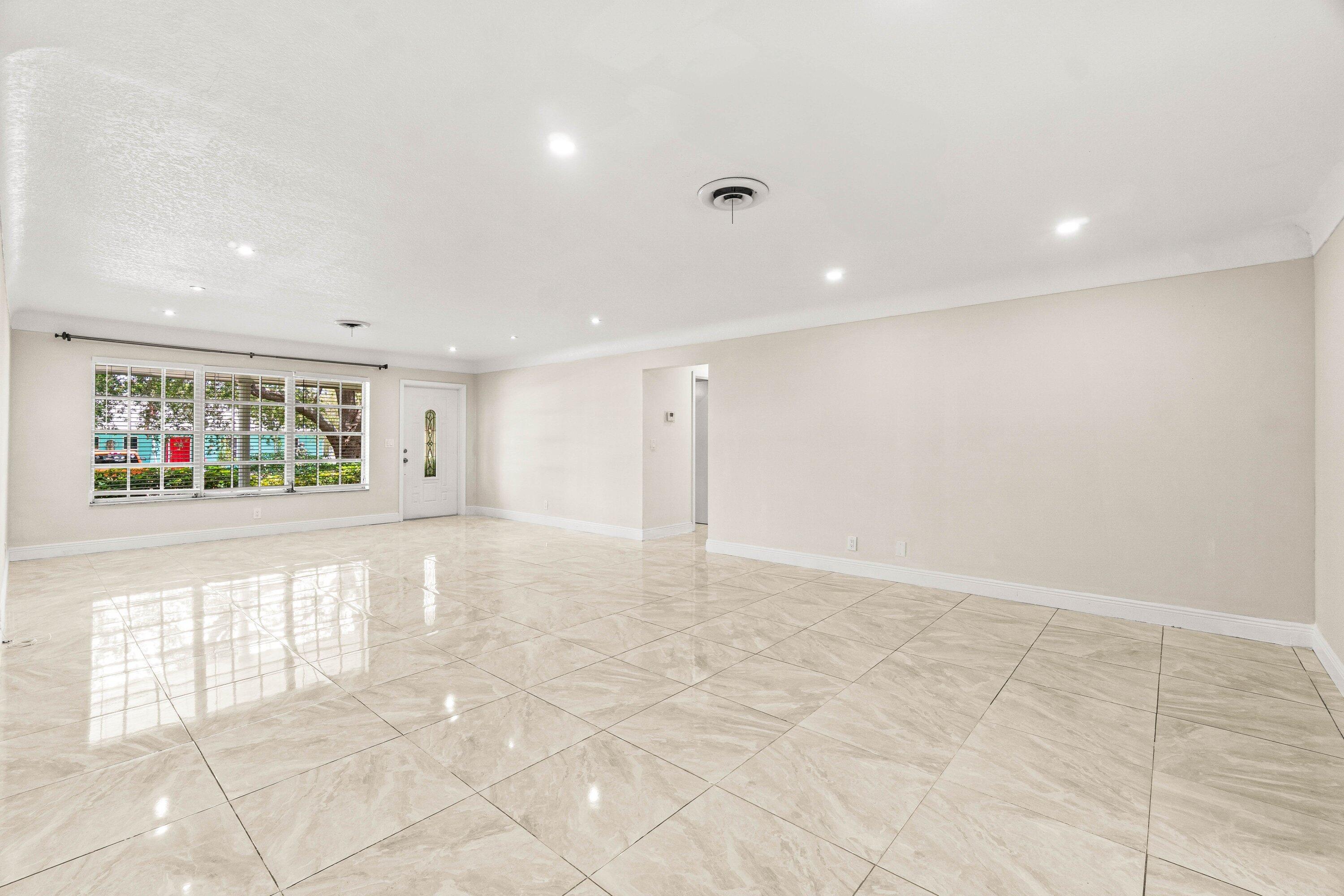 1290 Southwest 8th Street Boca Raton, FL 33486 - Photo 7 of 29 a view of an empty room with window