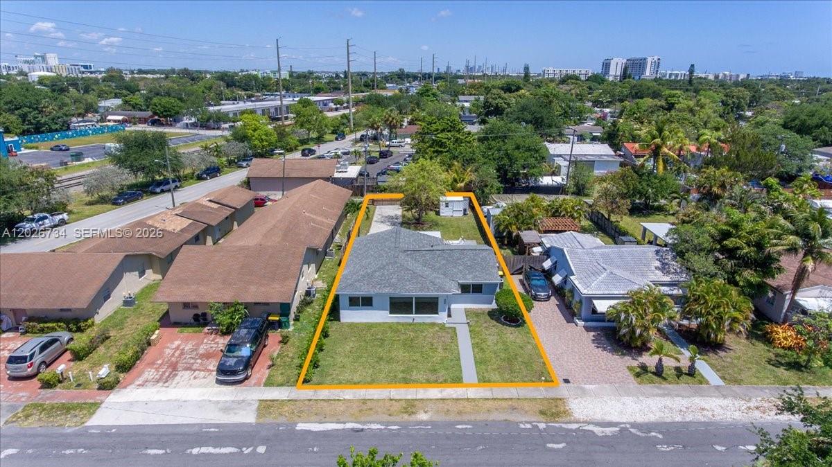 266 Southwest 6th Street Dania Beach, FL 33004 - Photo 2 of 37 an aerial view of residential houses with outdoor space and street view