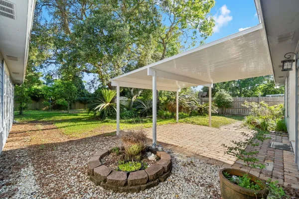 a view of a backyard with a garden