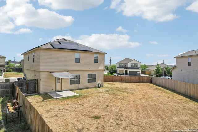 a view of a house with a patio
