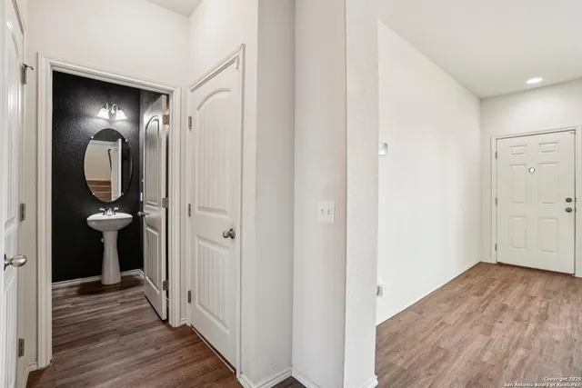 a view of a livingroom from a hallway