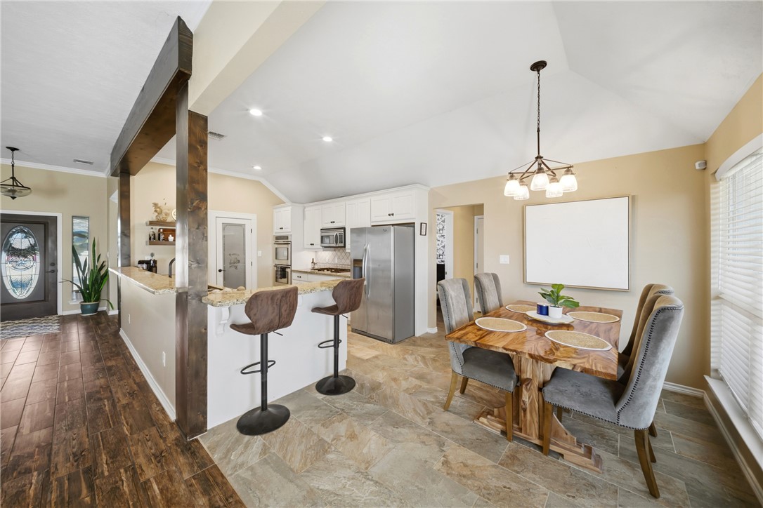 214 Apache Drive Franklin, TX 77856 - Photo 13 of 32 a view of a livingroom with furniture and a floor to ceiling window