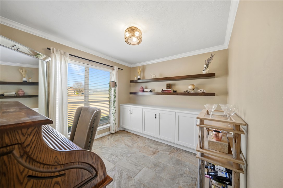 214 Apache Drive Franklin, TX 77856 - Photo 20 of 32 a bedroom with a bed and furniture