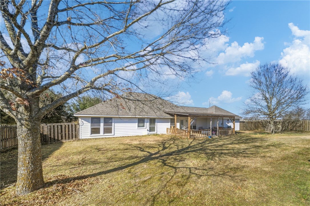 214 Apache Drive Franklin, TX 77856 - Photo 27 of 32 a front view of a house with a yard