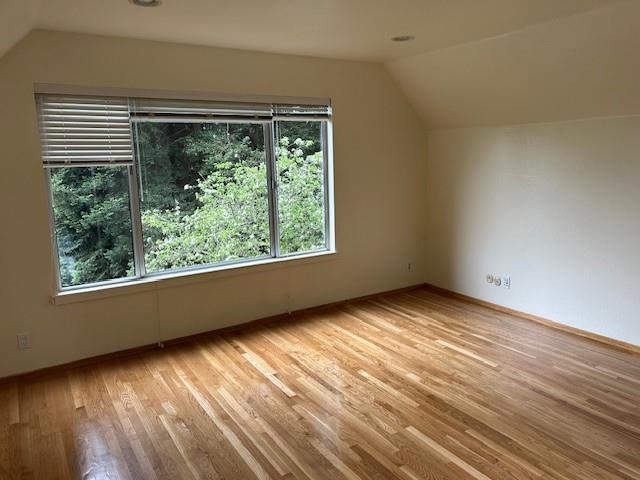 3757 Vienna Drive Aptos, CA 95003 - Photo 8 of 15 a view of an empty room with wooden floor and a window