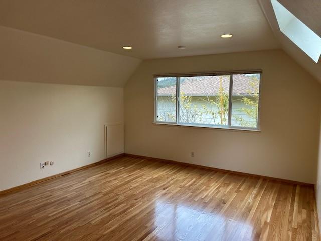 3757 Vienna Drive Aptos, CA 95003 - Photo 9 of 15 an empty room with wooden floor and windows