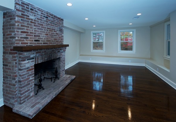 60 Boulder Rd Extension Wellesley, MA 02481 - Photo 11 of 21 a view of empty room with wooden floor and fireplace