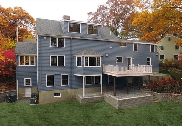 60 Boulder Rd Extension Wellesley, MA 02481 - Photo 17 of 21 a view of a house with a yard and sitting area