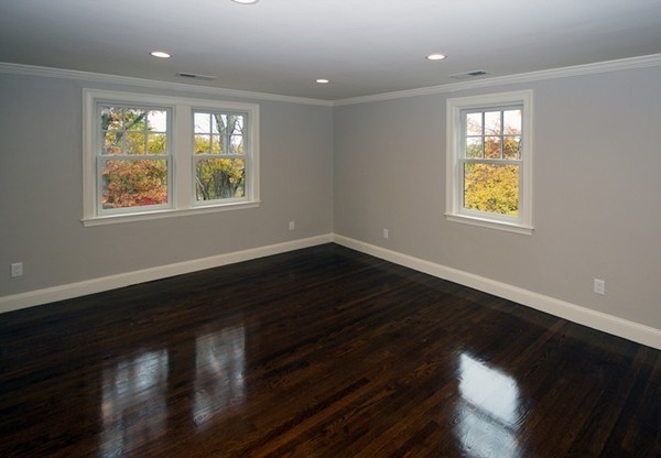 60 Boulder Rd Extension Wellesley, MA 02481 - Photo 3 of 21 an empty room with wooden floor and windows