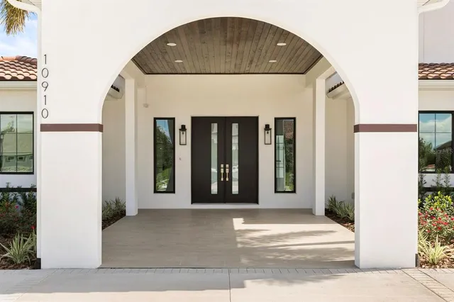 a front view of a house with a garage