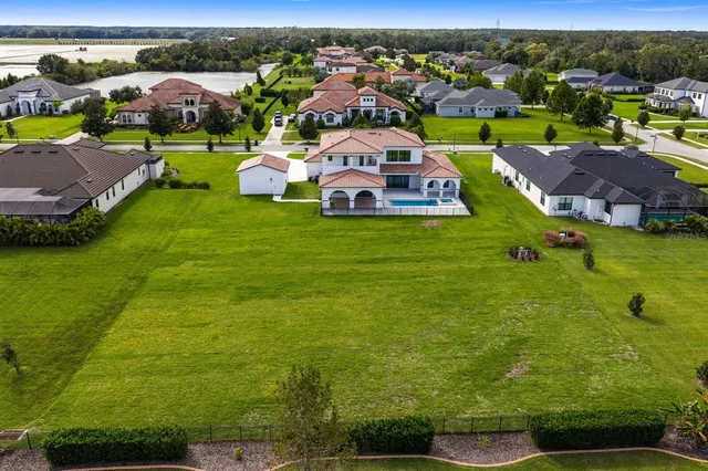 an aerial view of a house with garden