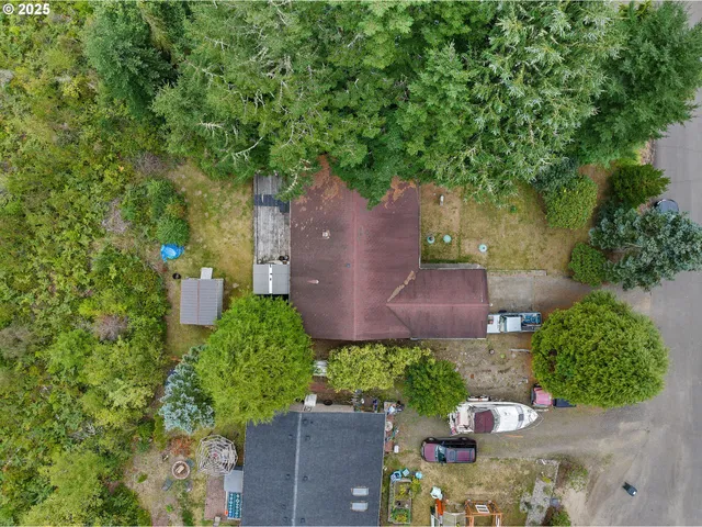 an aerial view of a house with a garden