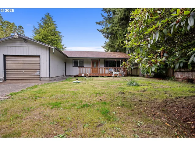 a house view with a garden space