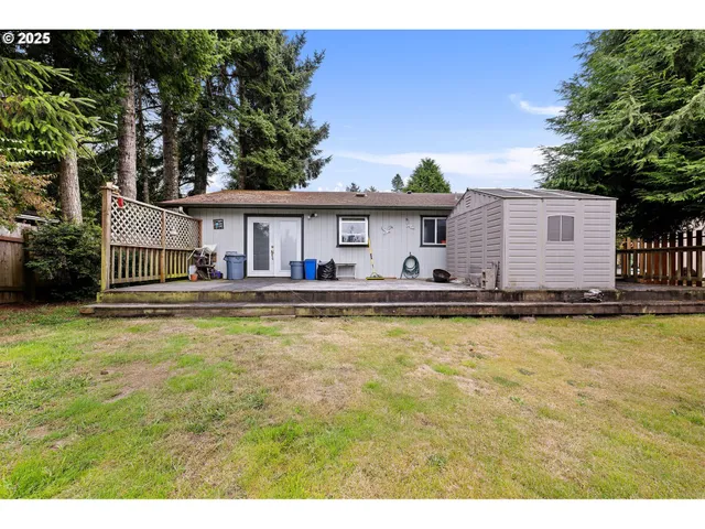 a front view of house with yard and seating area
