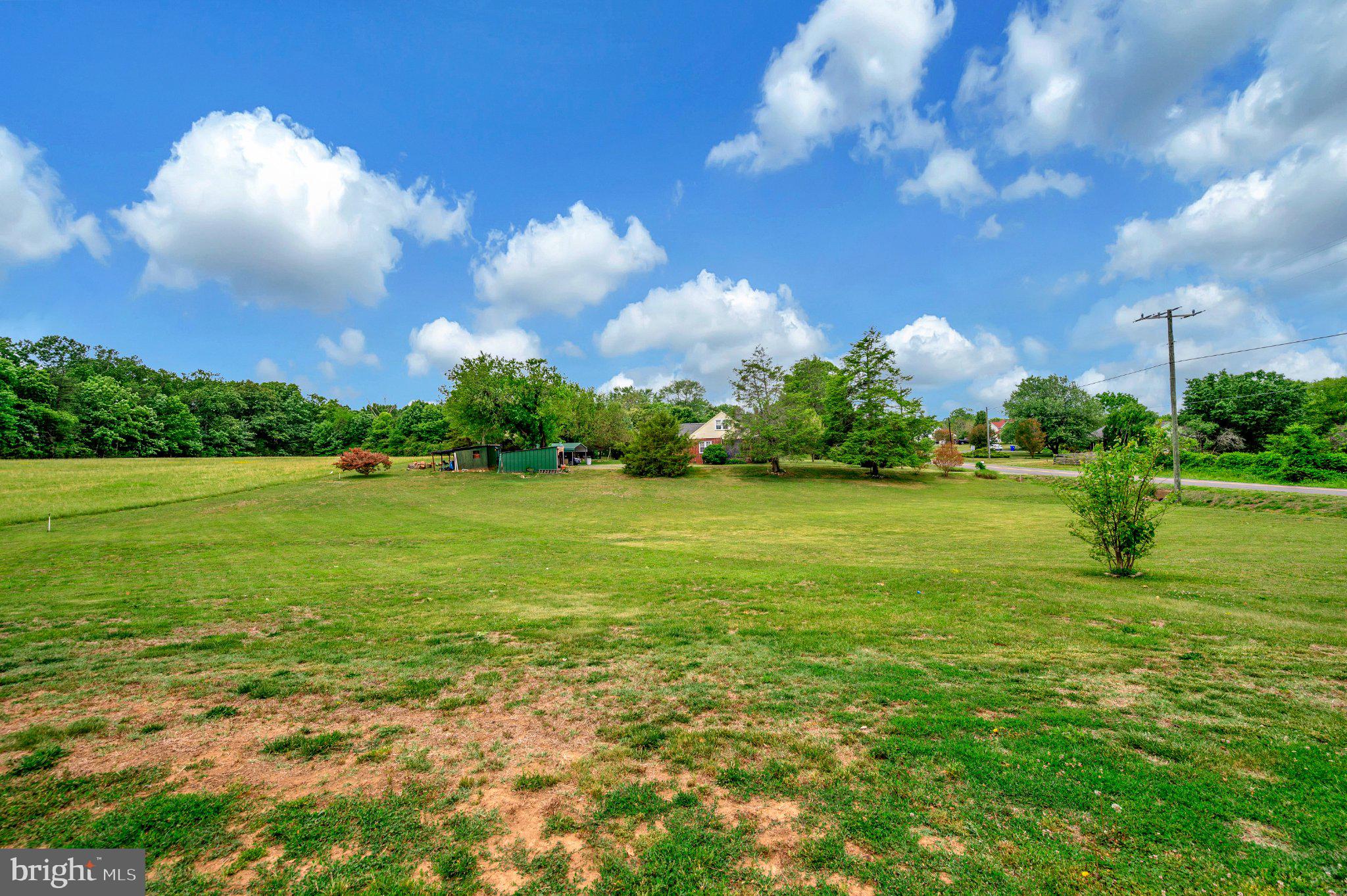 23202 Village Road Unionville, VA 22567 - Photo 53 of 58 a view of a golf course with a lake