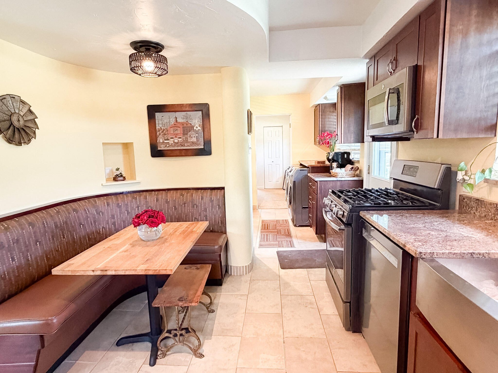 108 Beverly Place Munster, IN 46321 - Photo 16 of 47 a view of a kitchen with dining table and chairs