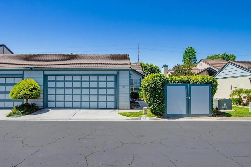a house view with a garden space