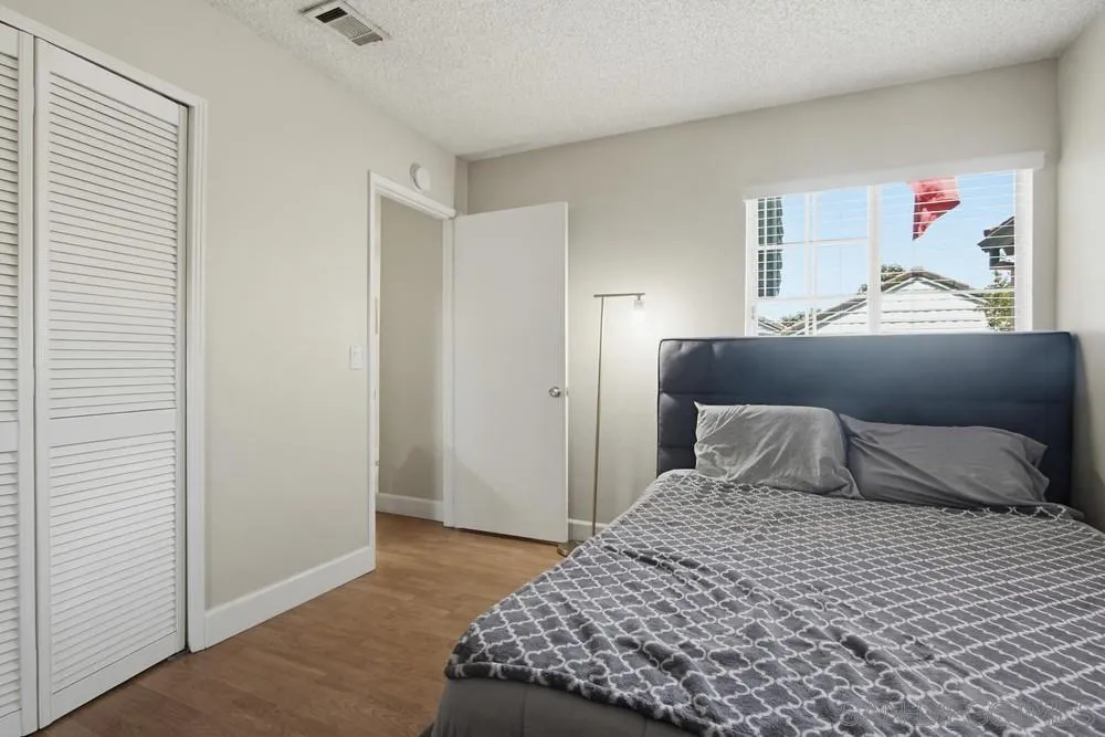 431 Nantucket Escondido, CA 92027 - Photo 20 of 30 a bedroom with a bed and a window
