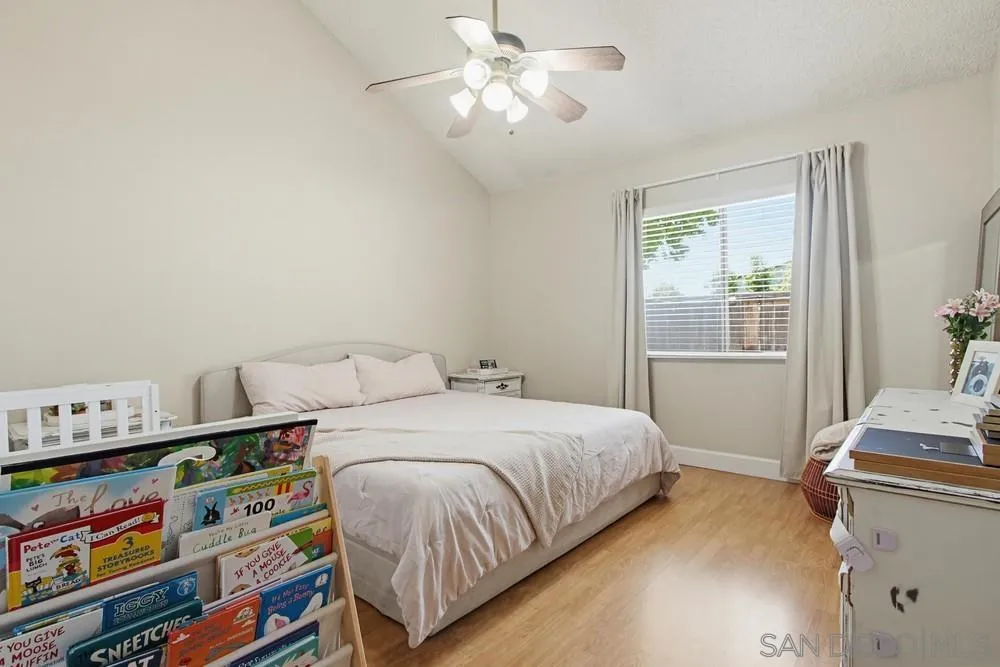 431 Nantucket Escondido, CA 92027 - Photo 25 of 30 a bedroom with a bed and a window in it