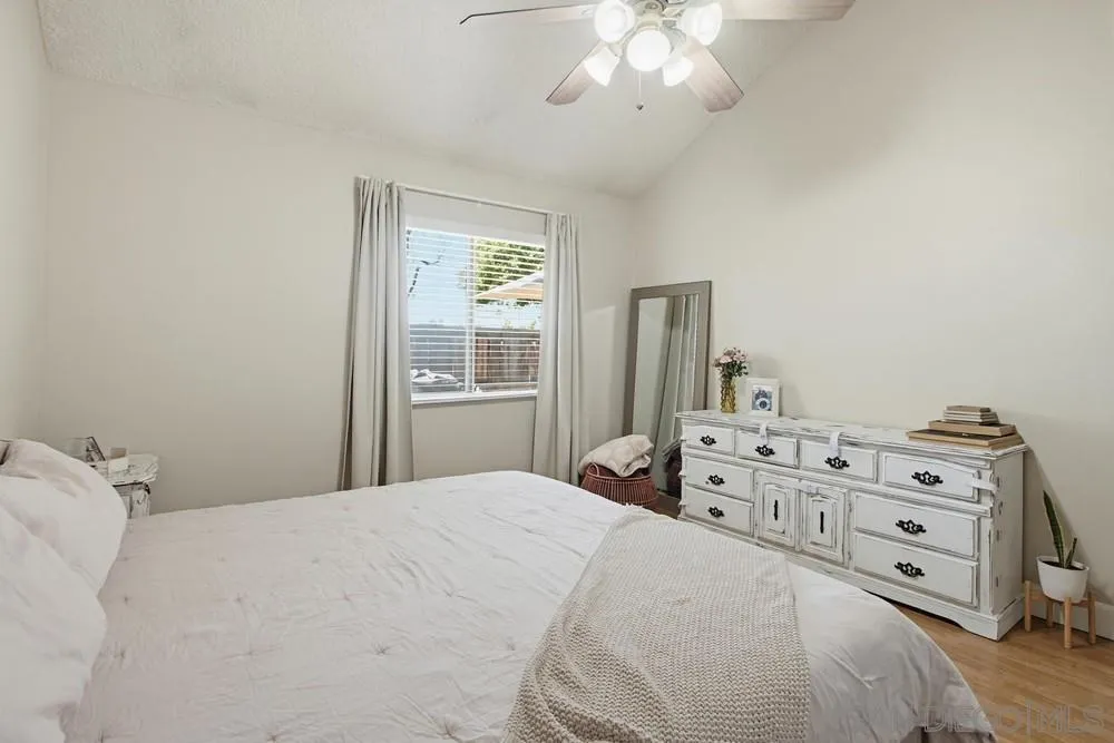 431 Nantucket Escondido, CA 92027 - Photo 26 of 30 a bedroom with a bed and a dresser