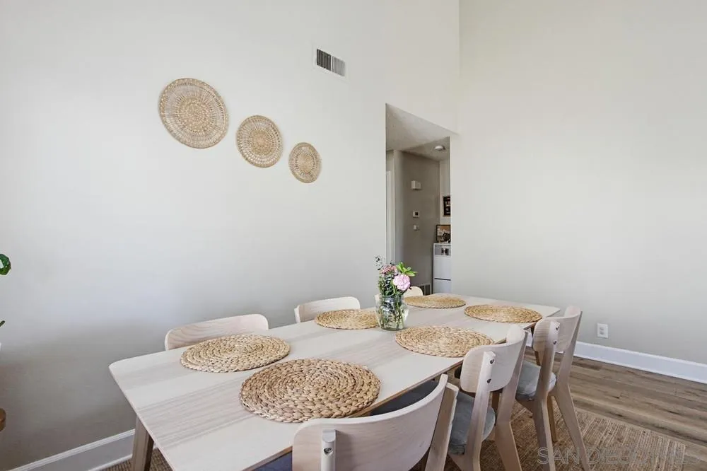431 Nantucket Escondido, CA 92027 - Photo 8 of 30 a dining room with furniture and wooden floor