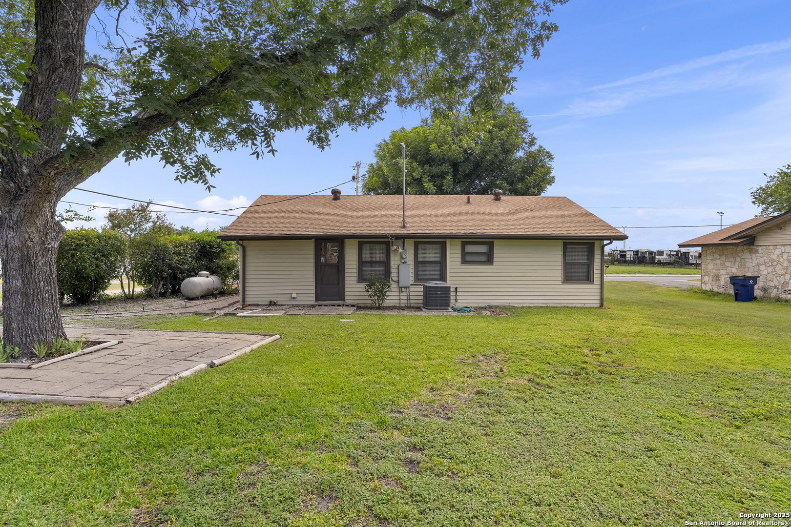 100 Haeckerville Road Cibolo, TX 78108 - Photo 13 of 31 a view of a house with a yard